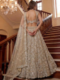 Phenomenal Cream Thread Embroidered Net Reception Wear Lehenga Choli