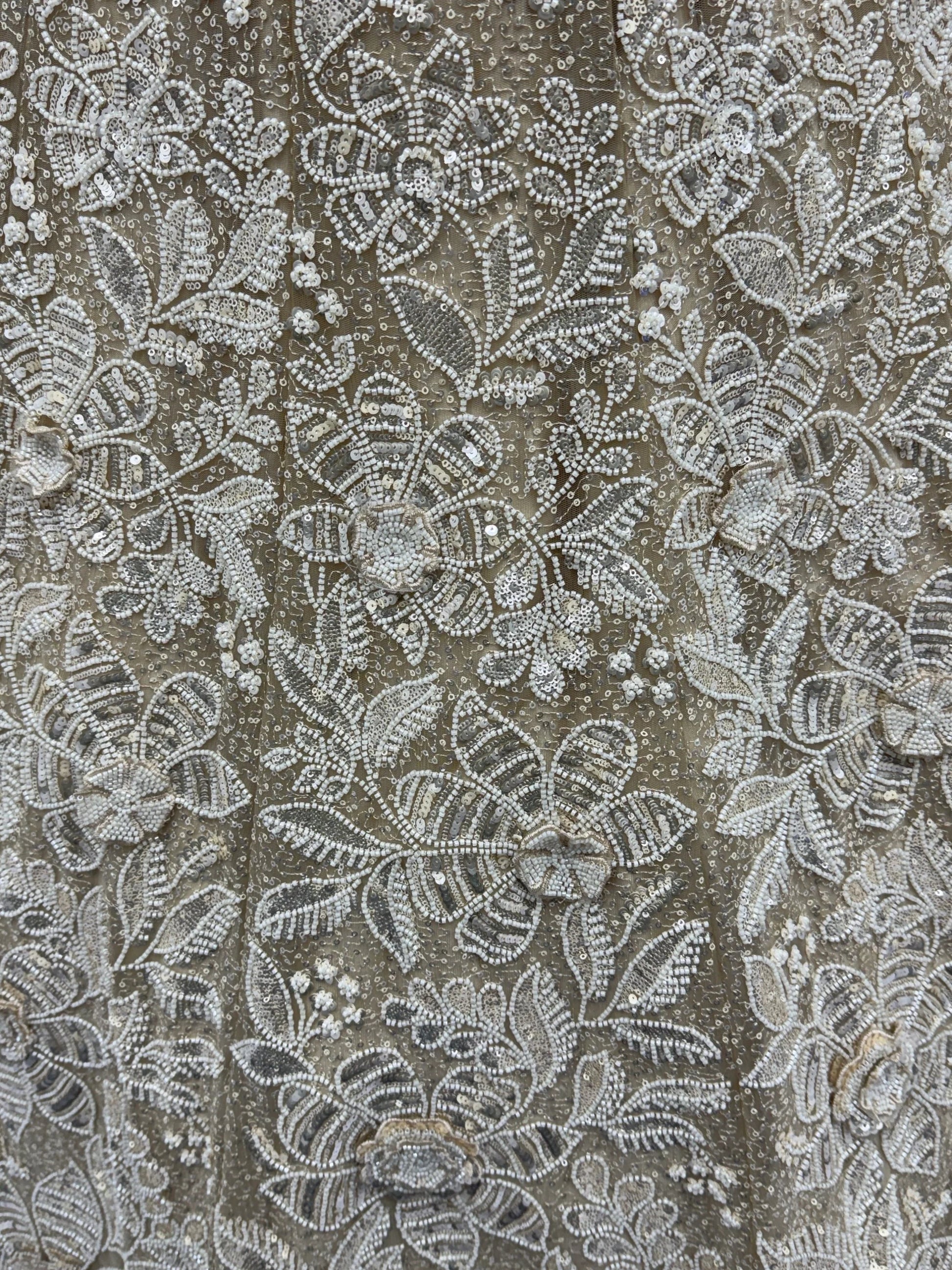 Phenomenal Cream Thread Embroidered Net Reception Wear Lehenga Choli