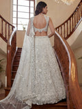 Timeless White Embroidered Net Wedding Wear Lehenga With Blouse
