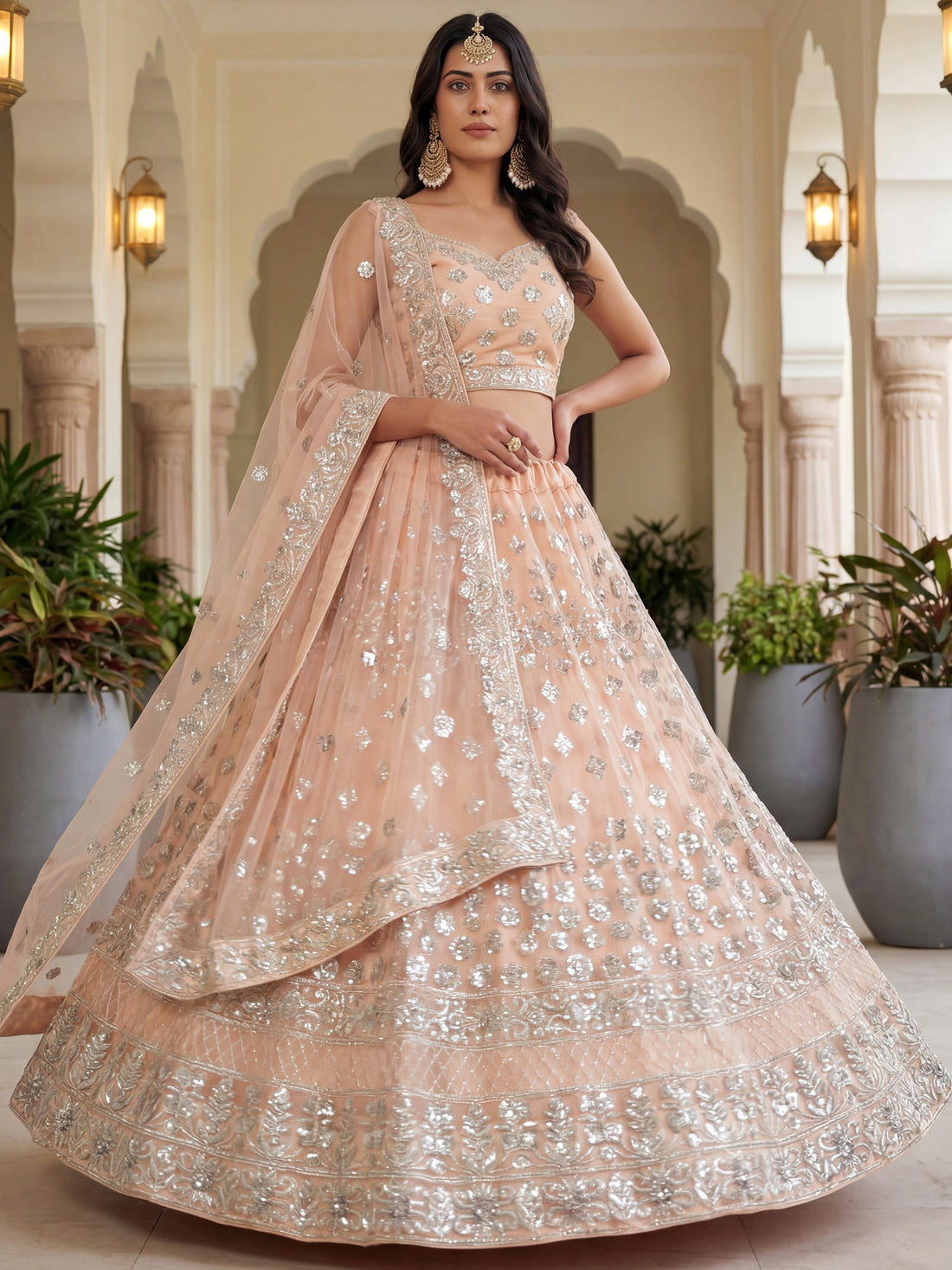 Glamorous Peach Zari Work Net Engagement Wear Lehenga Choli