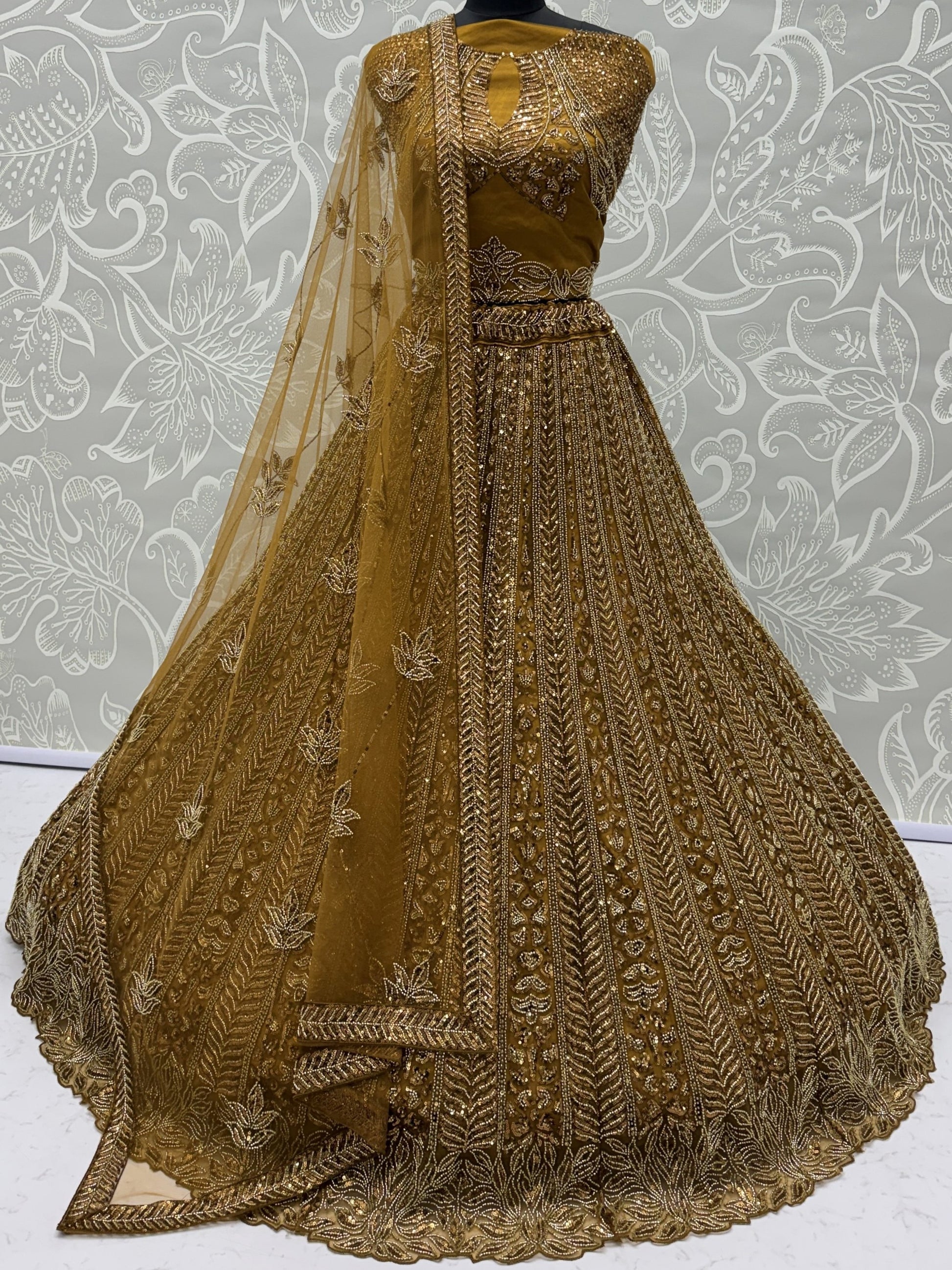 Beautiful Golden Heavy Embroidered Net Bridal Lehenga Choli With Dupatta