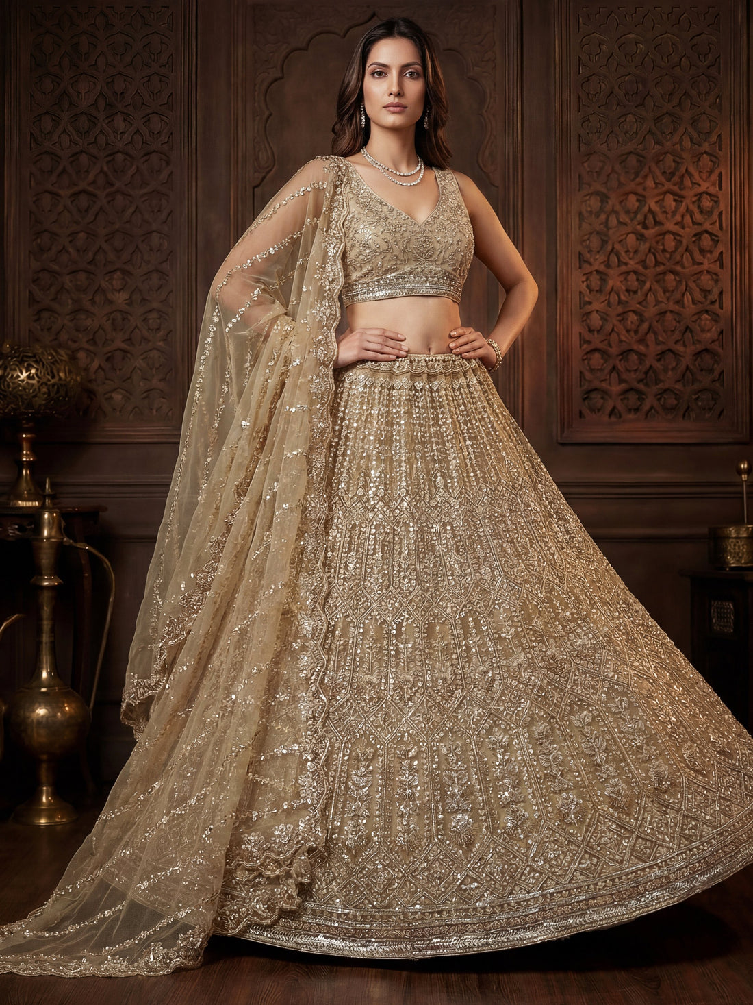 Sparkling Golden Hand Embroidery Net Reception Wear Lehenga Choli