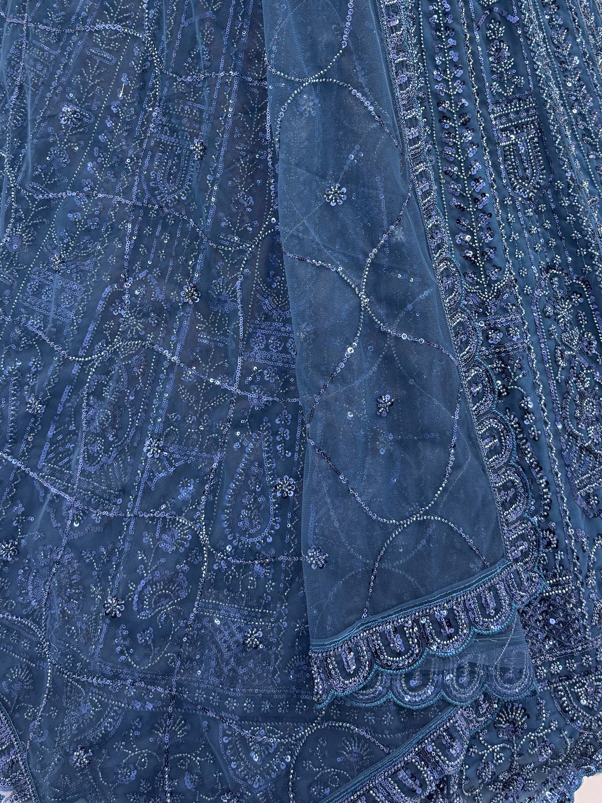 Sparkling Teal Blue Sequins Embroidery Net Reception Wear Lehenga With Blouse
