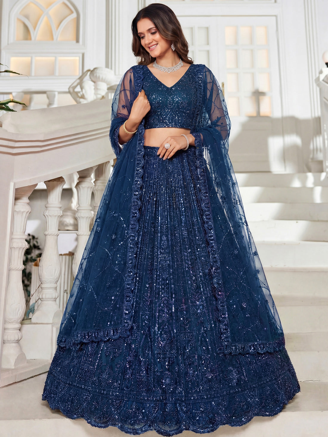 Sparkling Teal Blue Sequins Embroidery Net Reception Wear Lehenga With Blouse