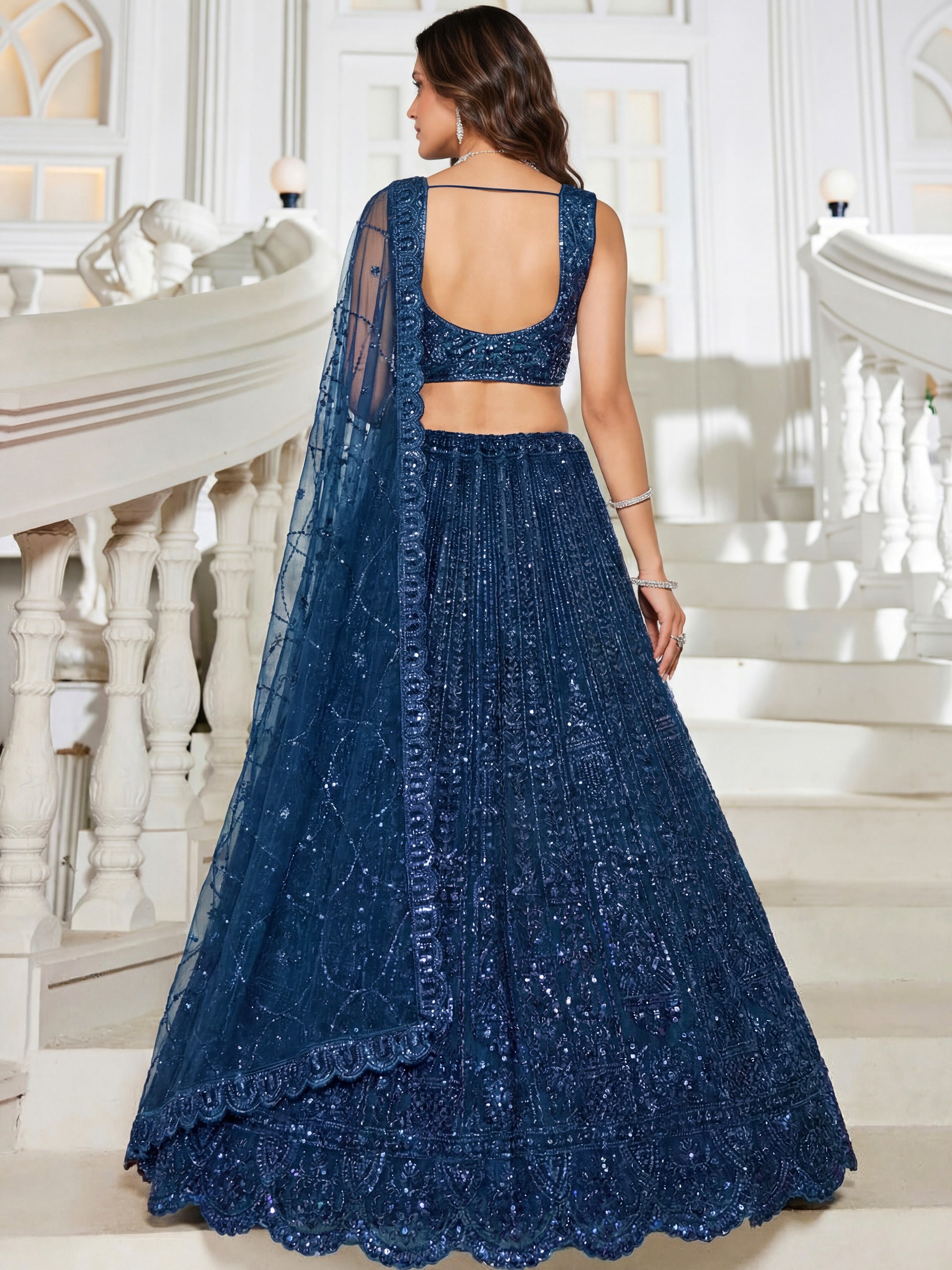 Sparkling Teal Blue Sequins Embroidery Net Reception Wear Lehenga With Blouse