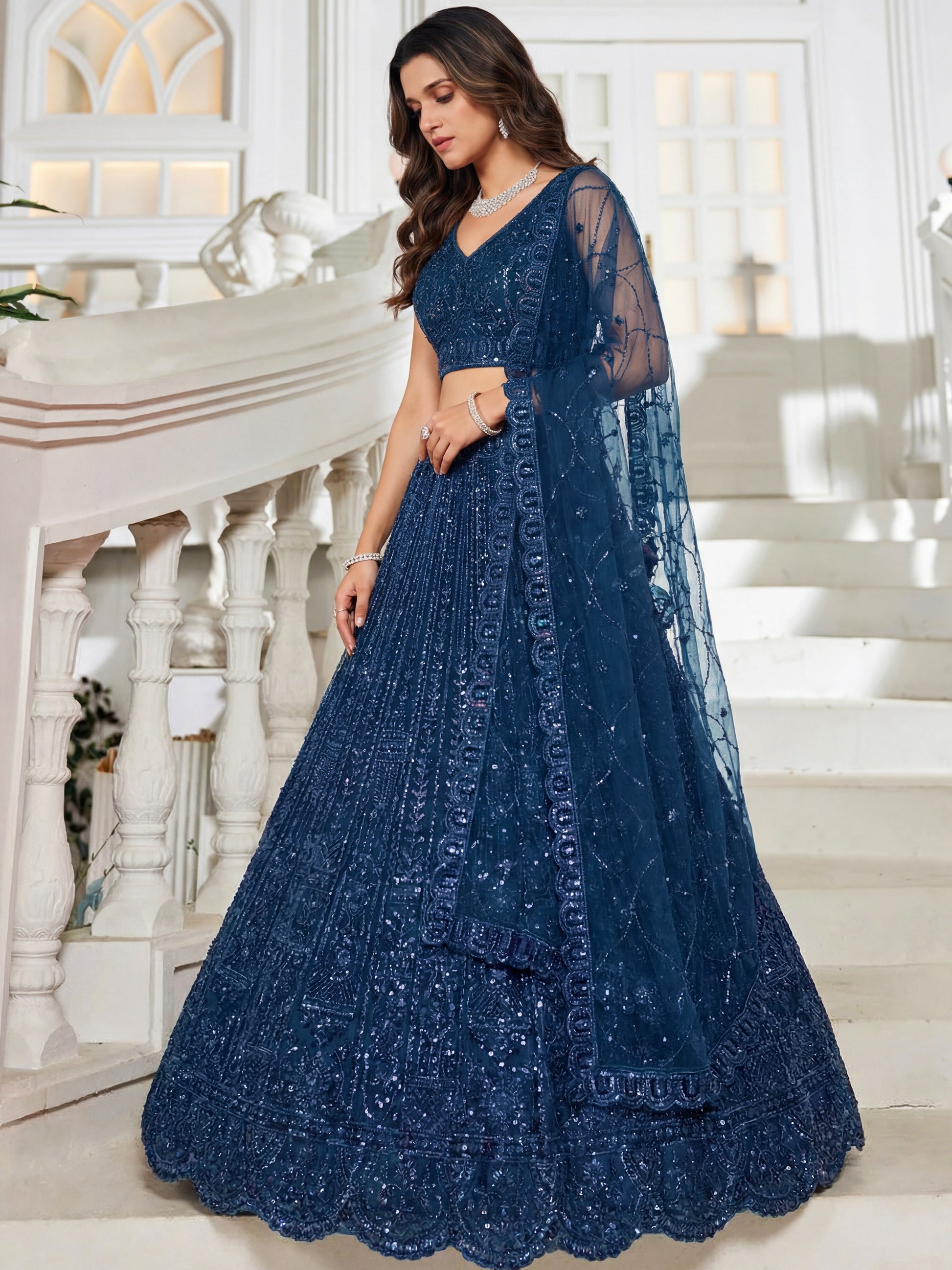 Sparkling Teal Blue Sequins Embroidery Net Reception Wear Lehenga With Blouse