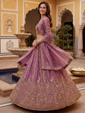 Tantalizing Purple Zari Embroidered Silk Engagement Wear Lehenga Choli