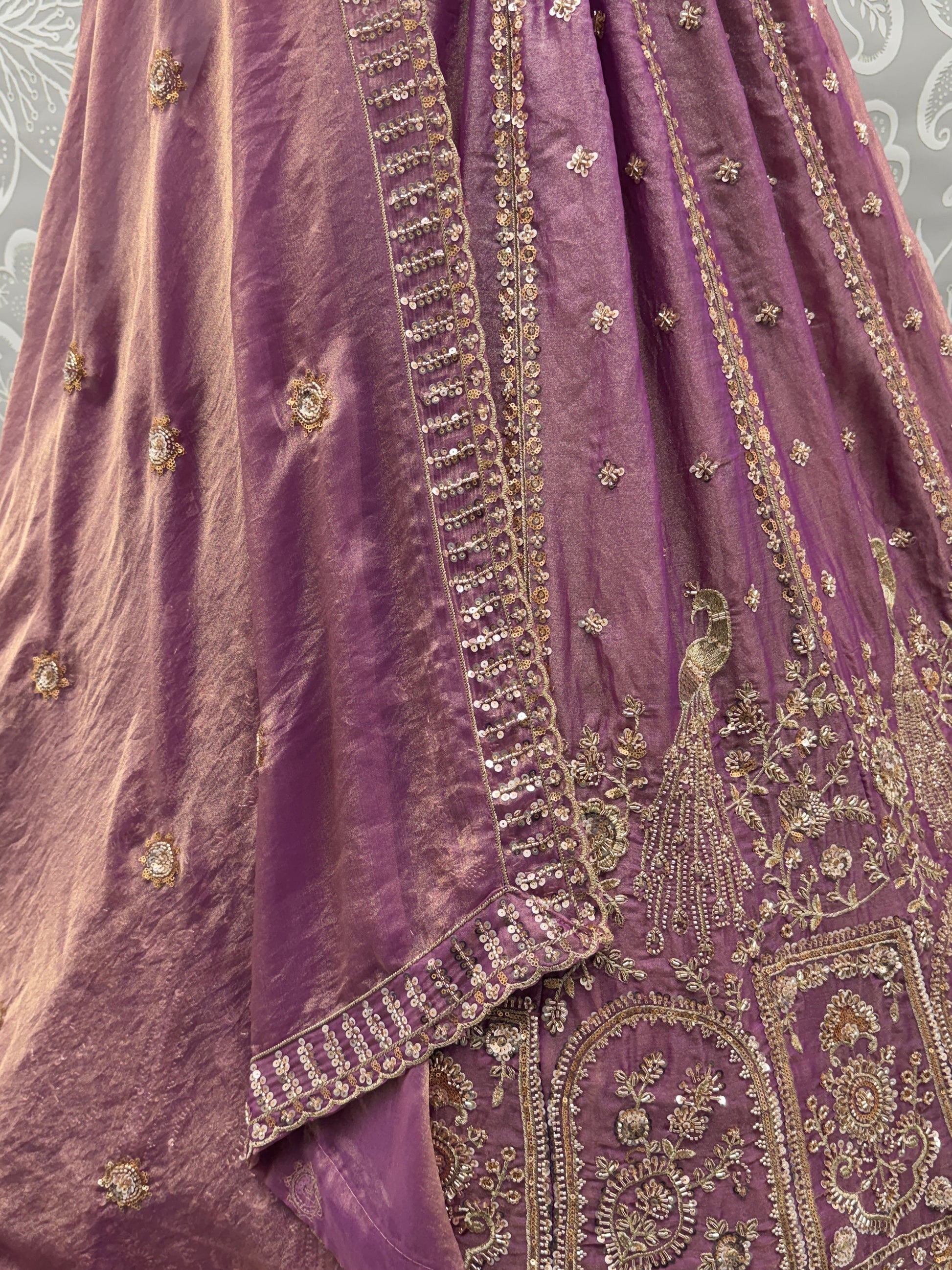 Tantalizing Purple Zari Embroidered Silk Engagement Wear Lehenga Choli