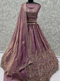 Tantalizing Purple Zari Embroidered Silk Engagement Wear Lehenga Choli