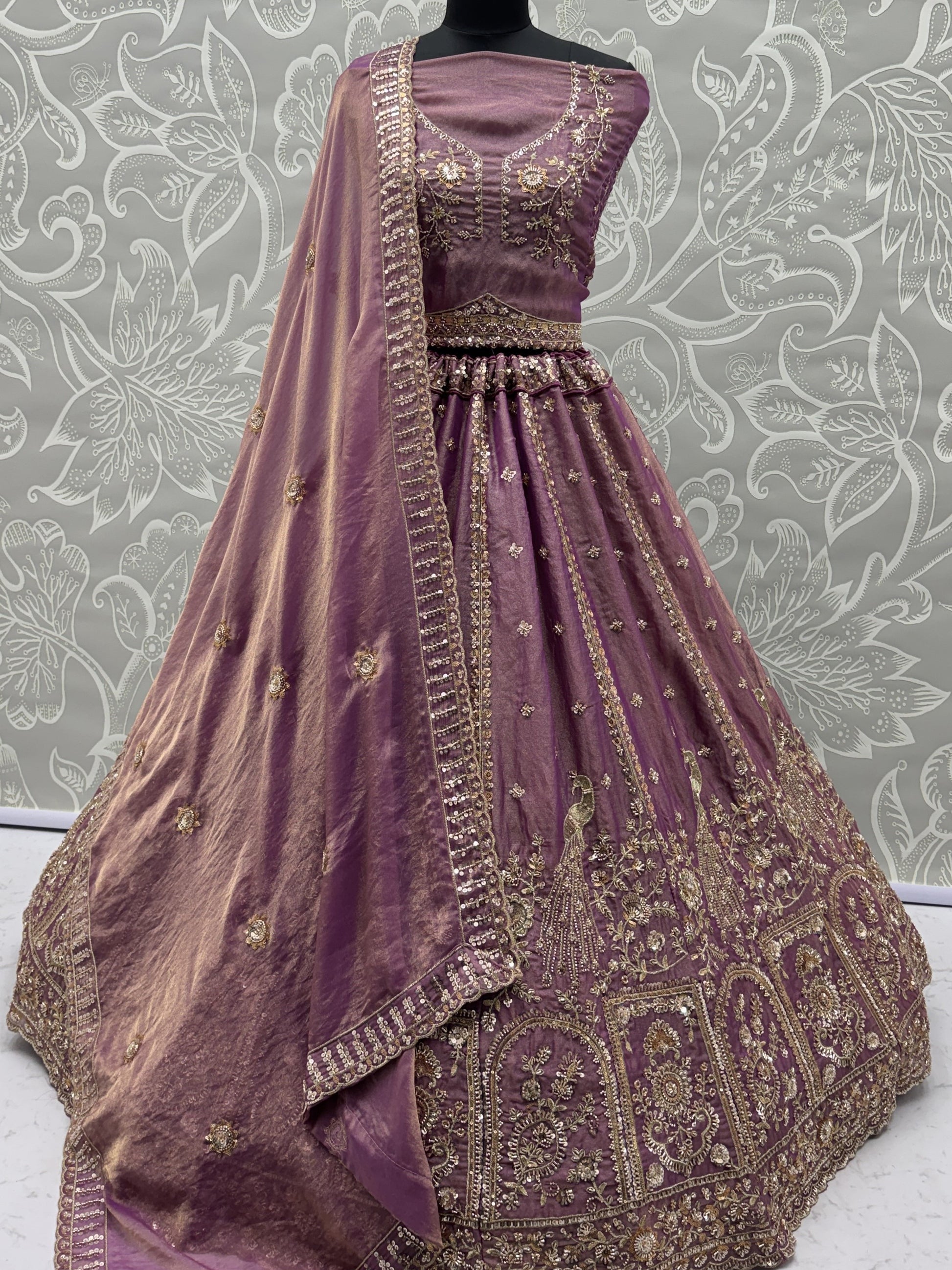 Tantalizing Purple Zari Embroidered Silk Engagement Wear Lehenga Choli