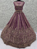 Tantalizing Purple Zari Embroidered Silk Engagement Wear Lehenga Choli