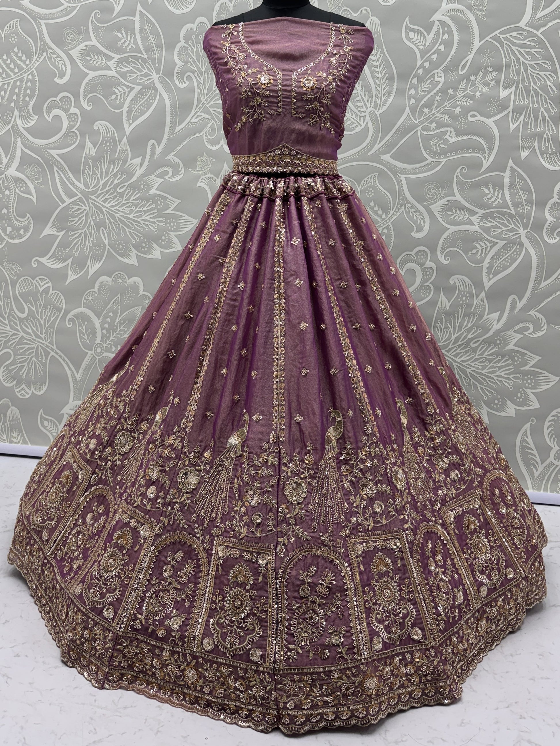 Tantalizing Purple Zari Embroidered Silk Engagement Wear Lehenga Choli