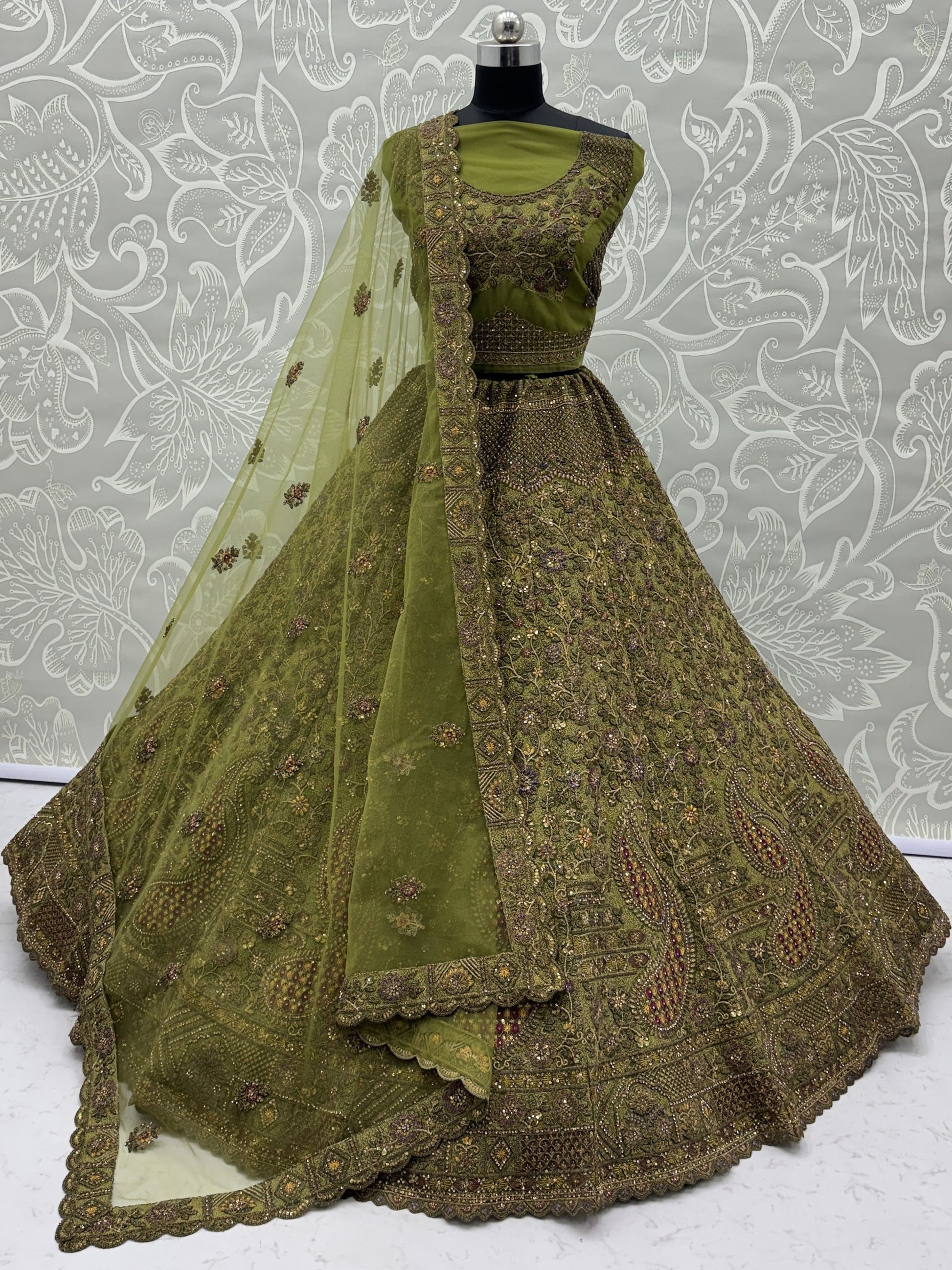 Tantalizing Olive Green Thread Embroidered Net Bridesmaid Lehenga Choli