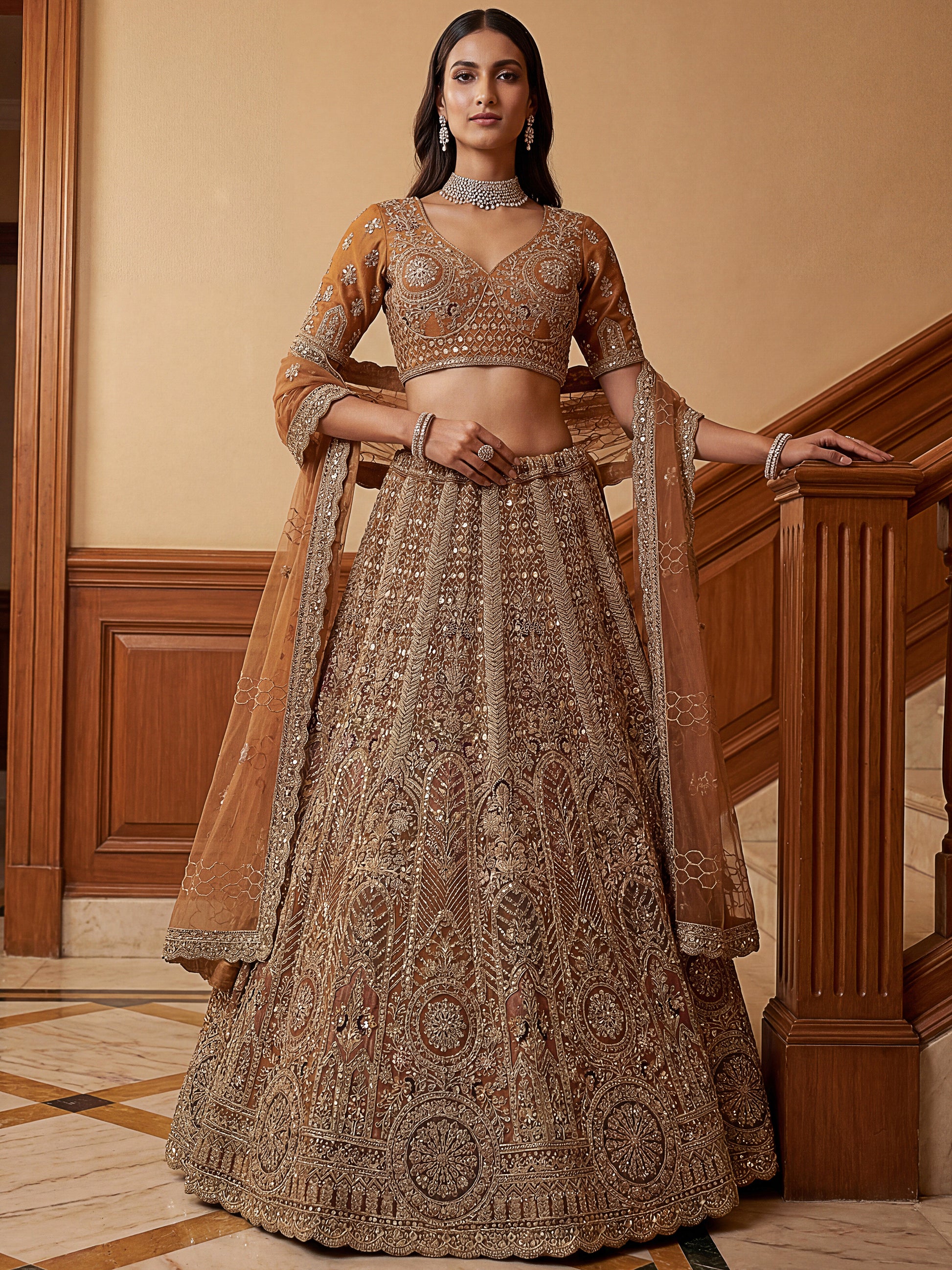 Precious Mustard Yellow Thread Embroidered Net Designer Lehenga Choli
