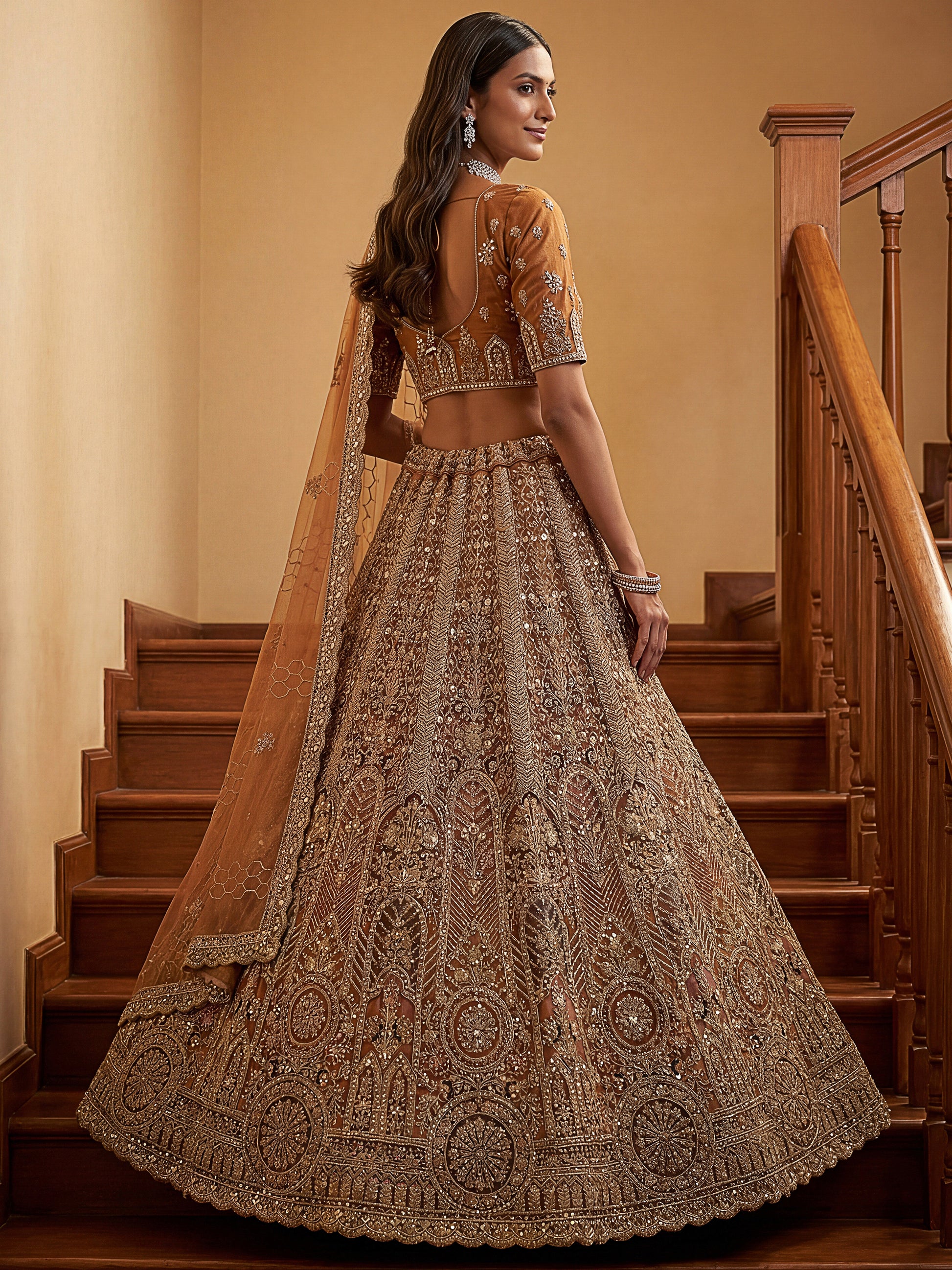 Precious Mustard Yellow Thread Embroidered Net Designer Lehenga Choli