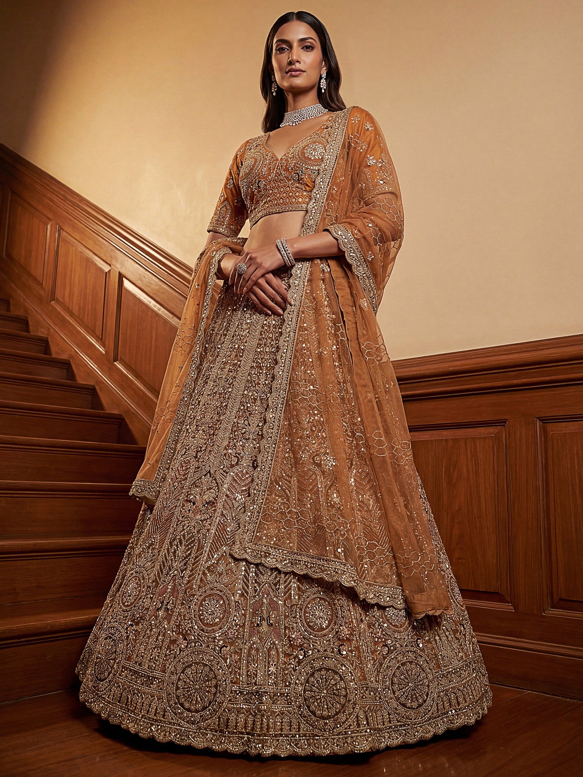 Precious Mustard Yellow Thread Embroidered Net Designer Lehenga Choli