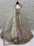 Lovely Off-White Sequins Net Reception Wear Lehenga Choli With Dupatta