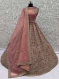 Attractive Dusty Pink Zari Embroidered Net Bridesmaid Lehenga Choli