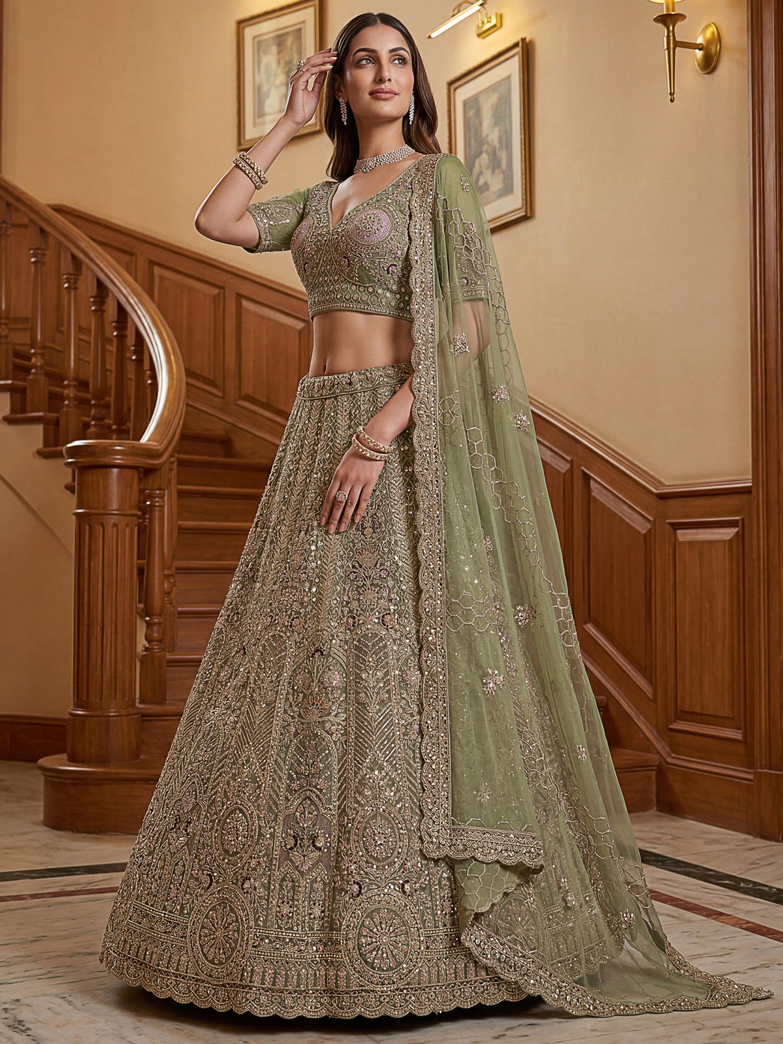 Graceful Green Zari Embroidered Net Engagement Wear Lehenga Choli