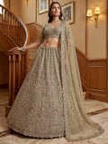 Graceful Green Zari Embroidered Net Engagement Wear Lehenga Choli