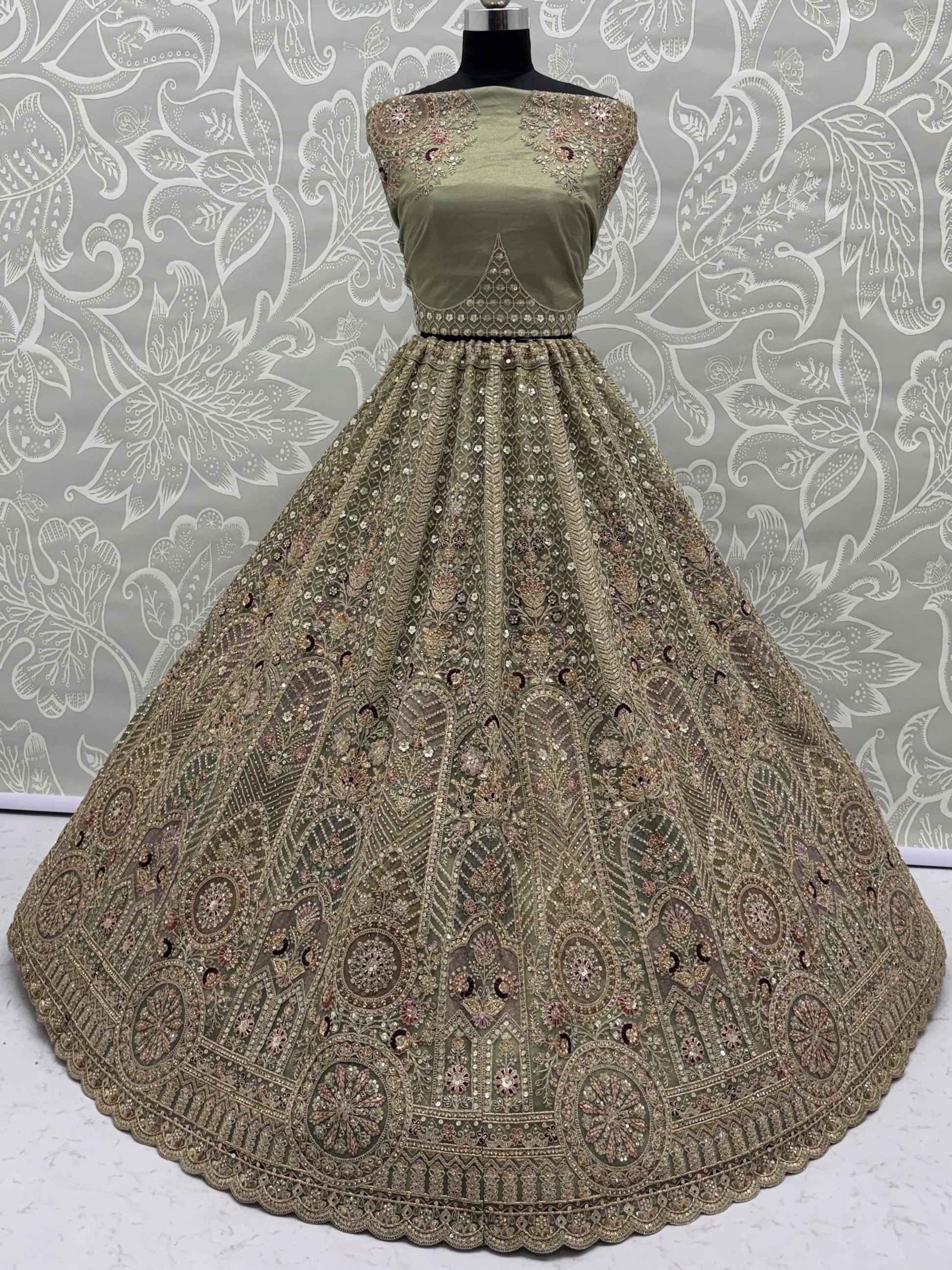 Graceful Green Zari Embroidered Net Engagement Wear Lehenga Choli