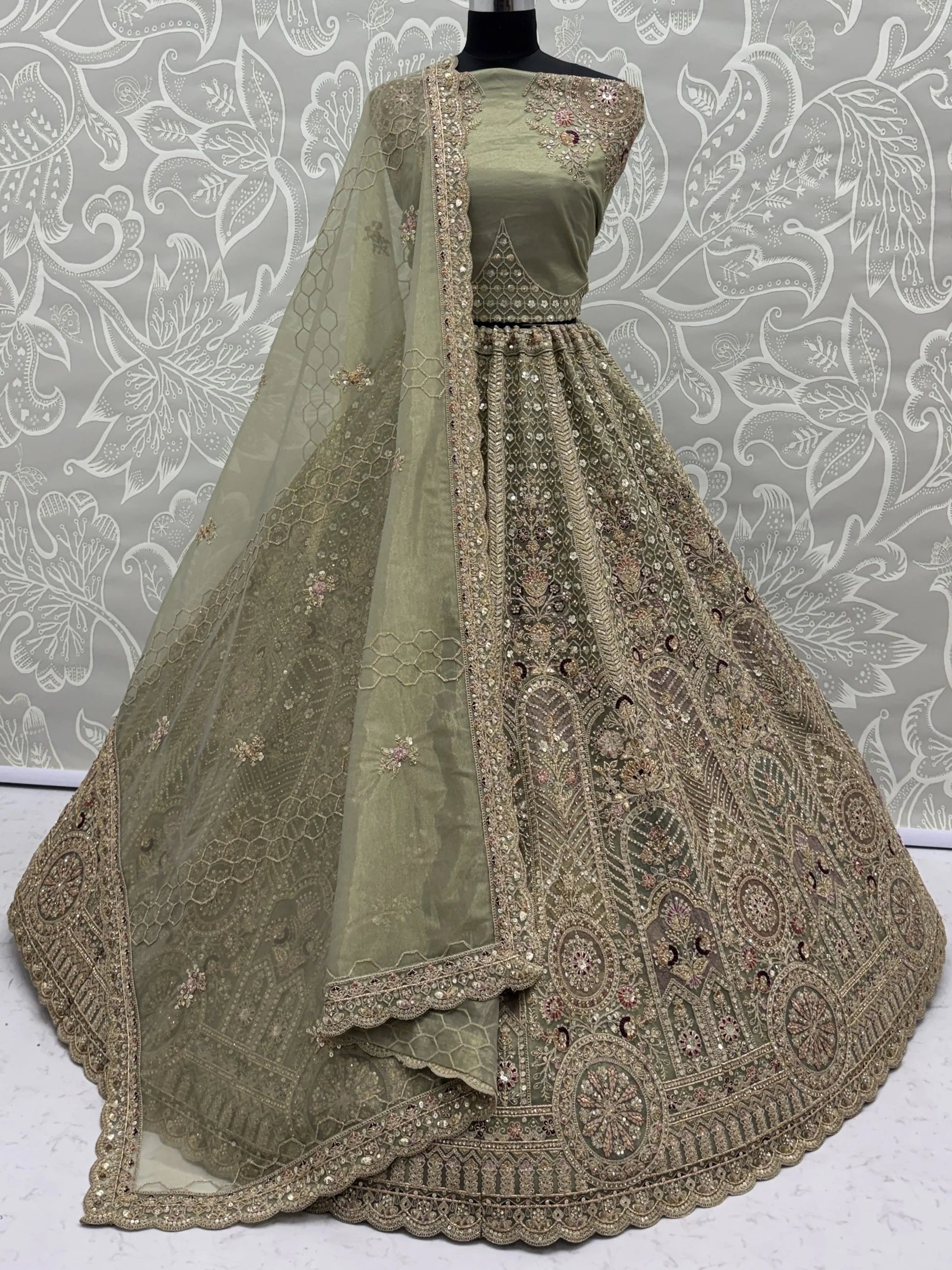 Graceful Green Zari Embroidered Net Engagement Wear Lehenga Choli