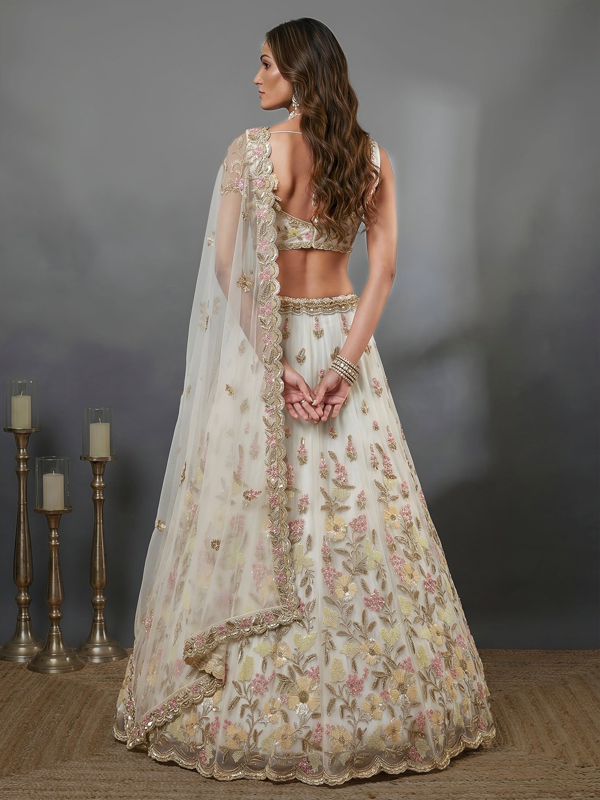 Astonishing White Hand Embroidered Net Reception Wear Lehenga Choli