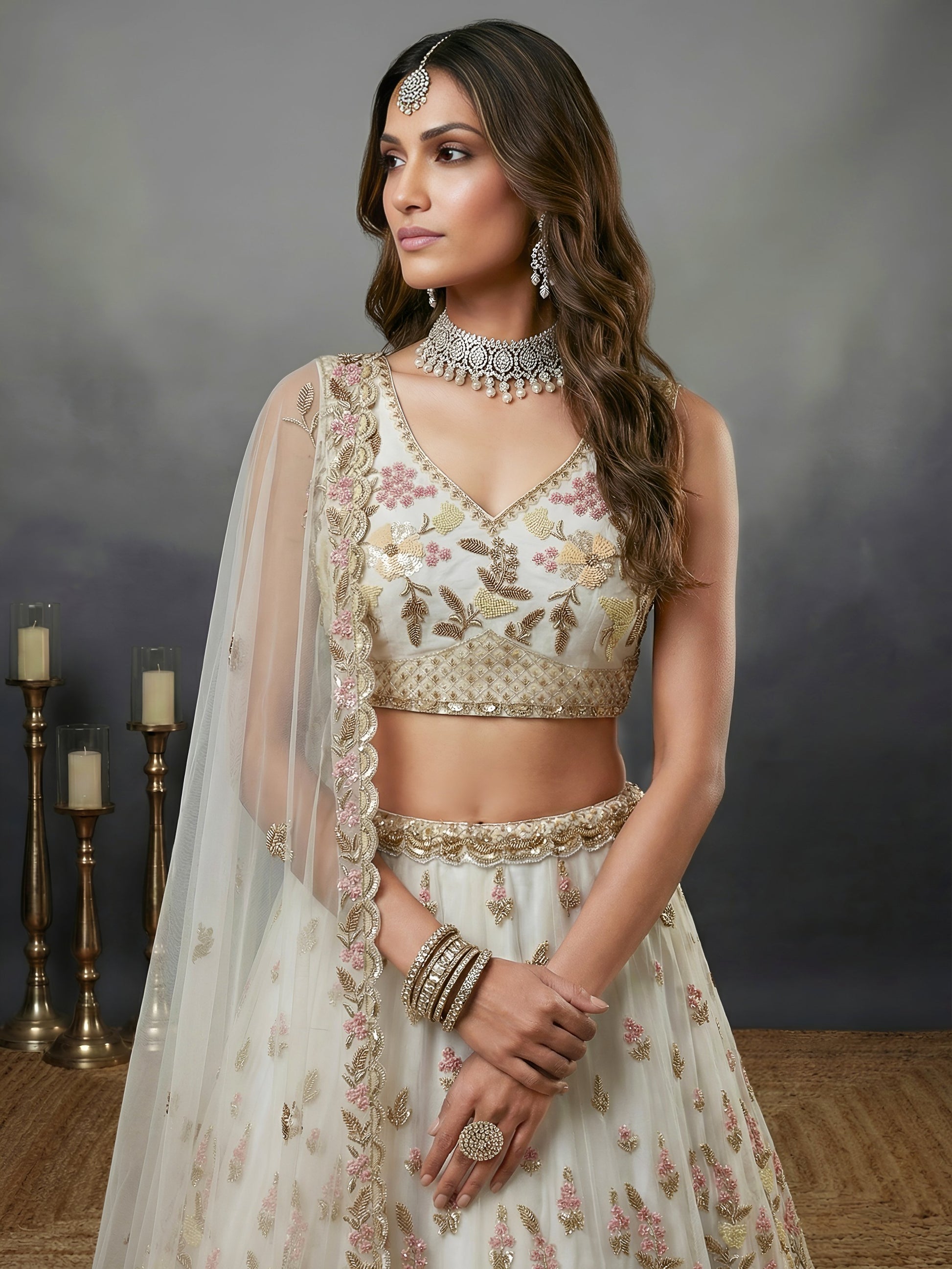 Astonishing White Hand Embroidered Net Reception Wear Lehenga Choli