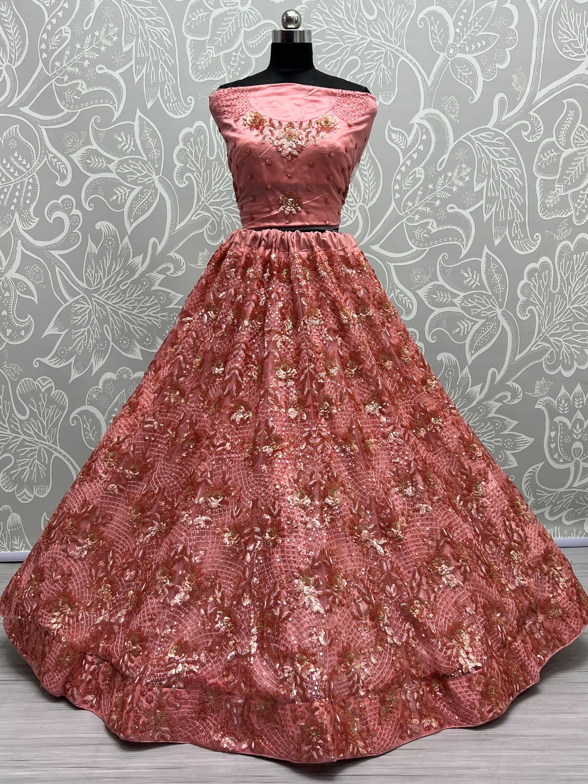Lavishing Peach Floral Embroidery Net Bridesmaid Lehenga Choli With Dupatta