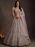 Sparkling Lavender Embroidery Net Wedding Wear Lehenga Choli with Dupatta