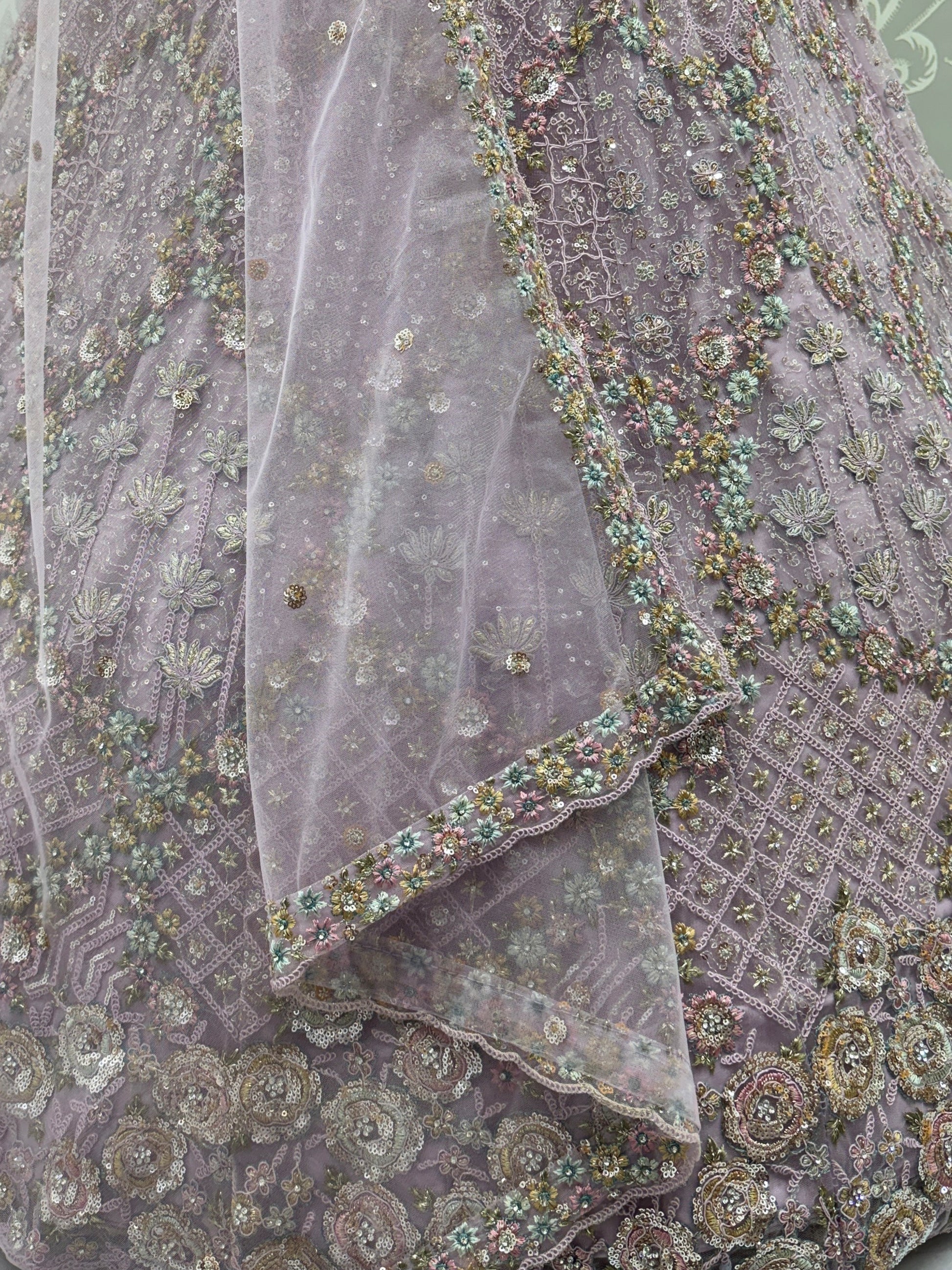Sparkling Lavender Embroidery Net Wedding Wear Lehenga Choli with Dupatta