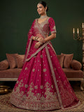 Sparkling Rani Pink Embroidered Silk  Bridal Wear Lehenga Choli