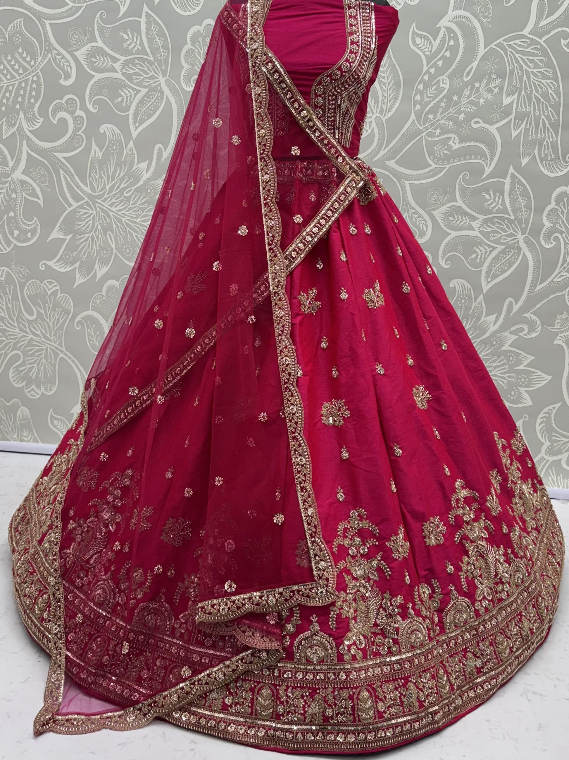 Sparkling Rani Pink Embroidered Silk  Bridal Wear Lehenga Choli