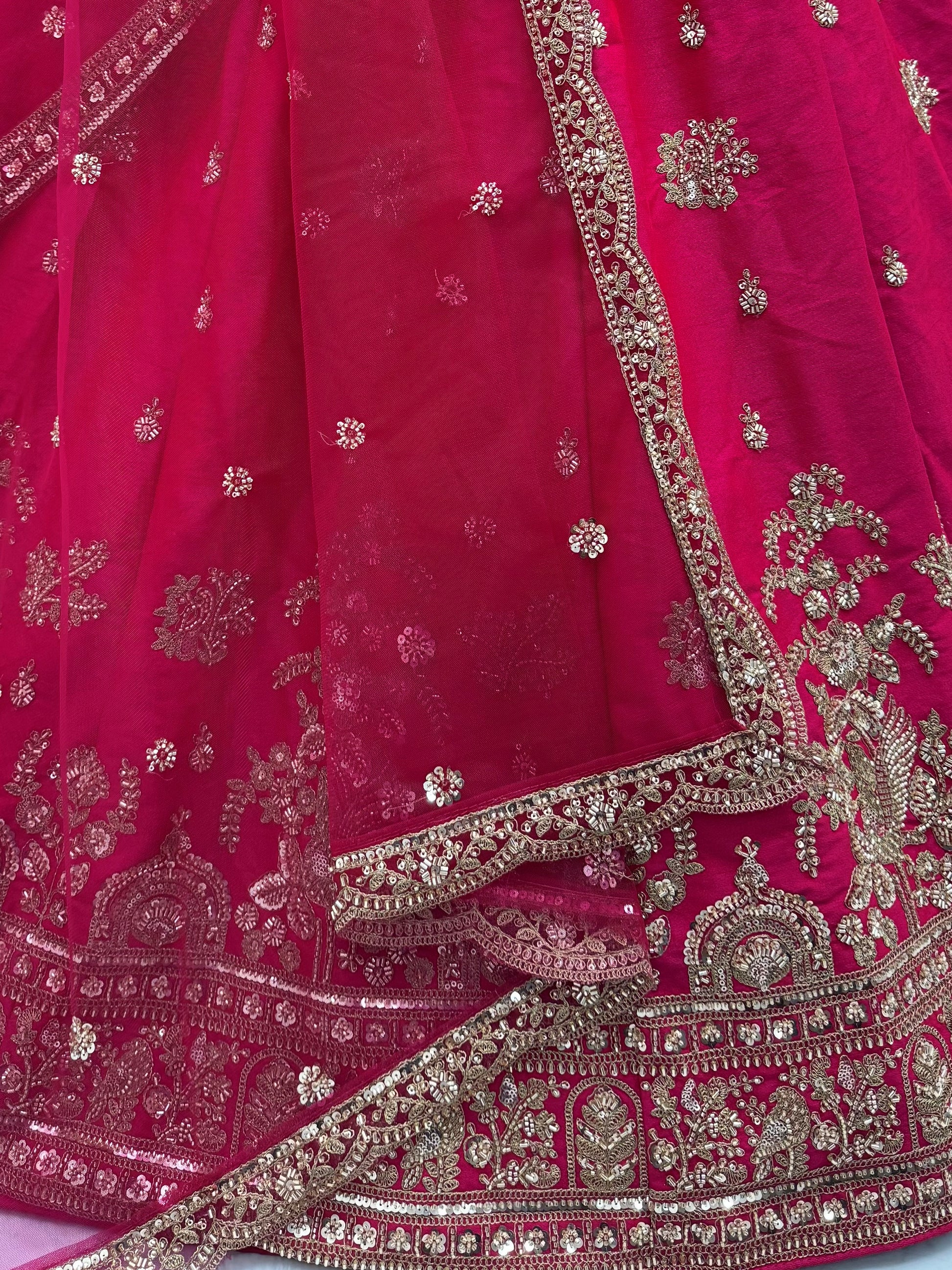 Sparkling Rani Pink Embroidered Silk  Bridal Wear Lehenga Choli