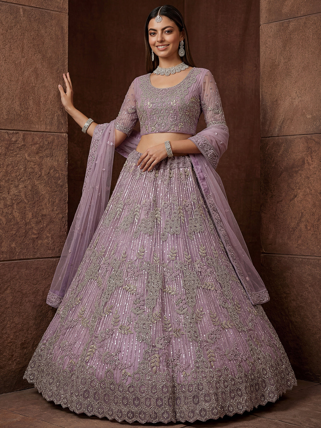 Attractive Lavender Zari Embroidered  Net Wedding Wear Lehenga Choli