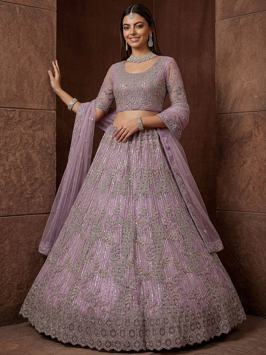 Attractive Lavender Zari Embroidered Net Wedding Wear Lehenga Choli