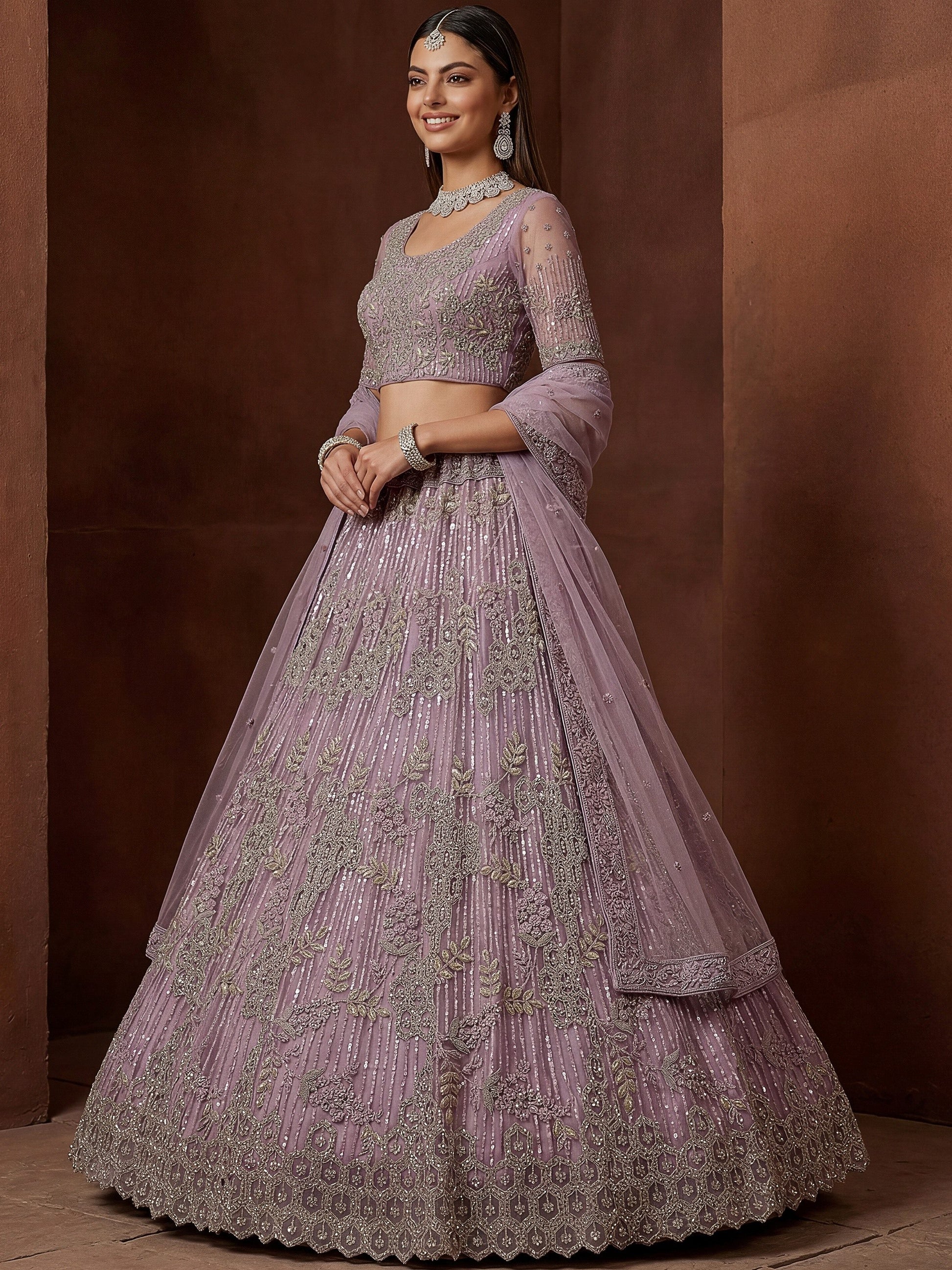 Attractive Lavender Zari Embroidered Net Wedding Wear Lehenga Choli