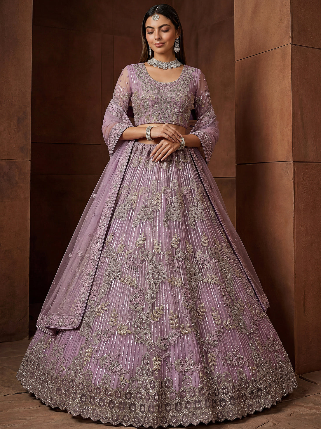 Attractive Lavender Zari Embroidered  Net Wedding Wear Lehenga Choli