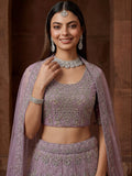 Attractive Lavender Zari Embroidered Net Wedding Wear Lehenga Choli