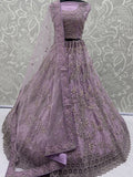 Attractive Lavender Zari Embroidered Net Wedding Wear Lehenga Choli