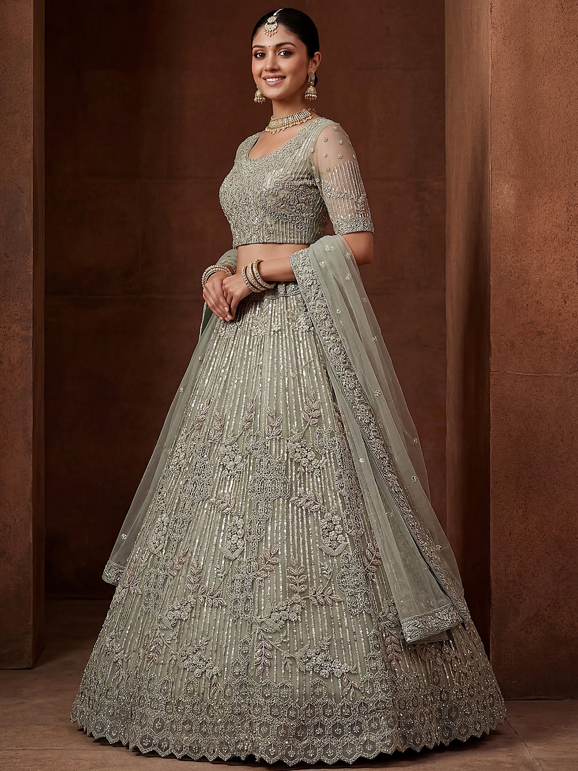 Glowing Pastel Green Diamond Work Net Reception Lehenga Choli