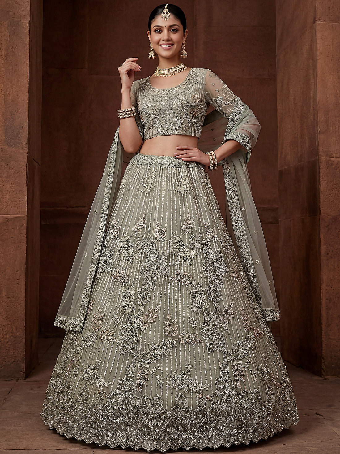 Glowing Pastel Green Diamond Work Net Reception Lehenga Choli