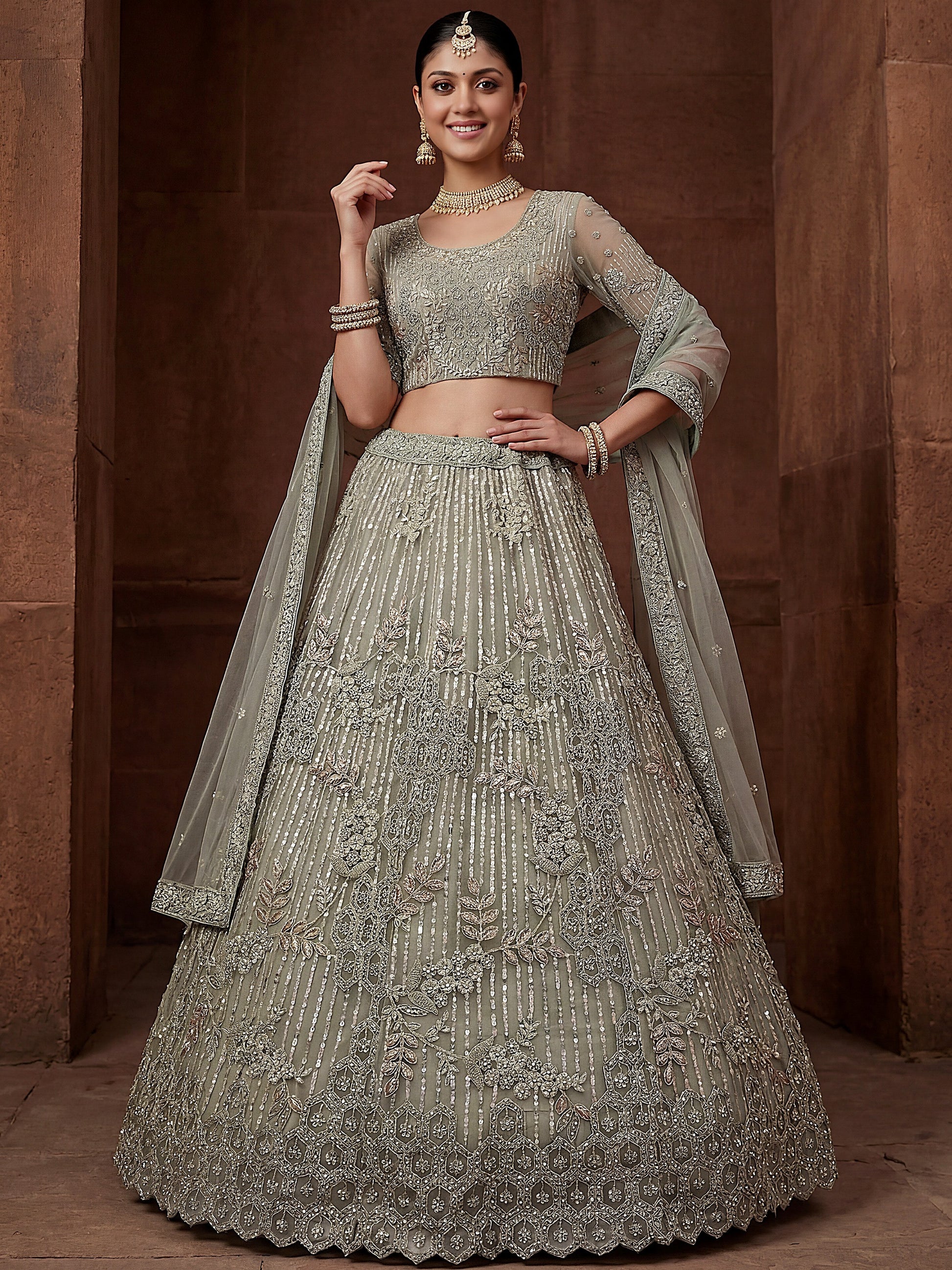 Glowing Pastel Green Diamond Work Net Reception Lehenga Choli
