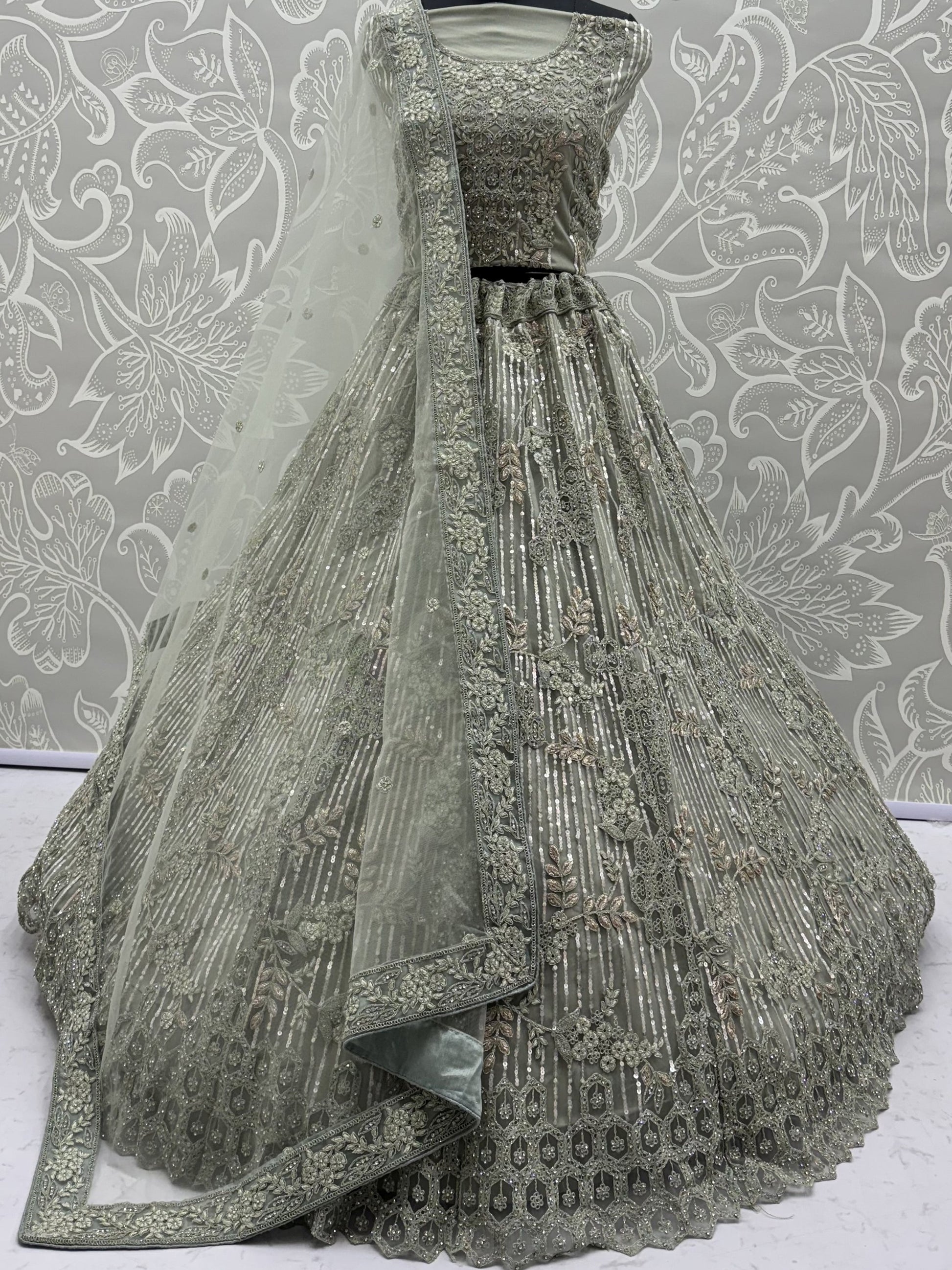 Glowing Pastel Green Diamond Work Net Reception Lehenga Choli