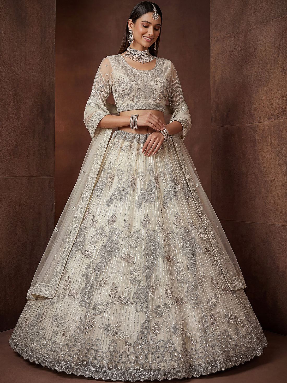 Gorgeous Off-White Zari Embroidered Net Wedding Wear Lehenga Choli