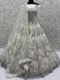 Gorgeous Off-White Zari Embroidered Net Wedding Wear Lehenga Choli