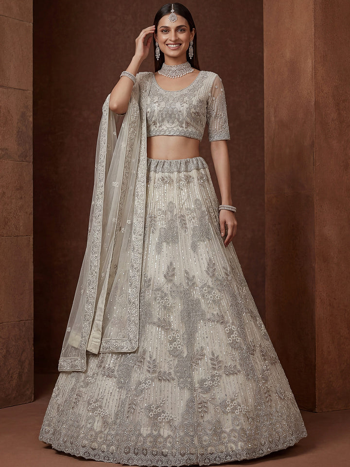 Gorgeous Off-White Zari Embroidered Net Wedding Wear Lehenga Choli
