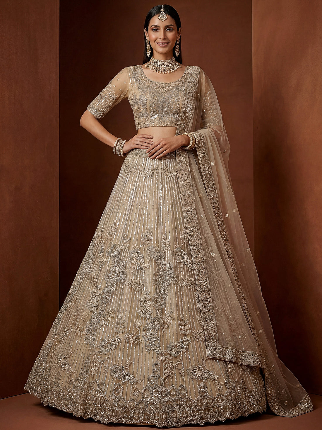 Incredible Beige Zari Embroidery Net Wedding Lehenga Choli