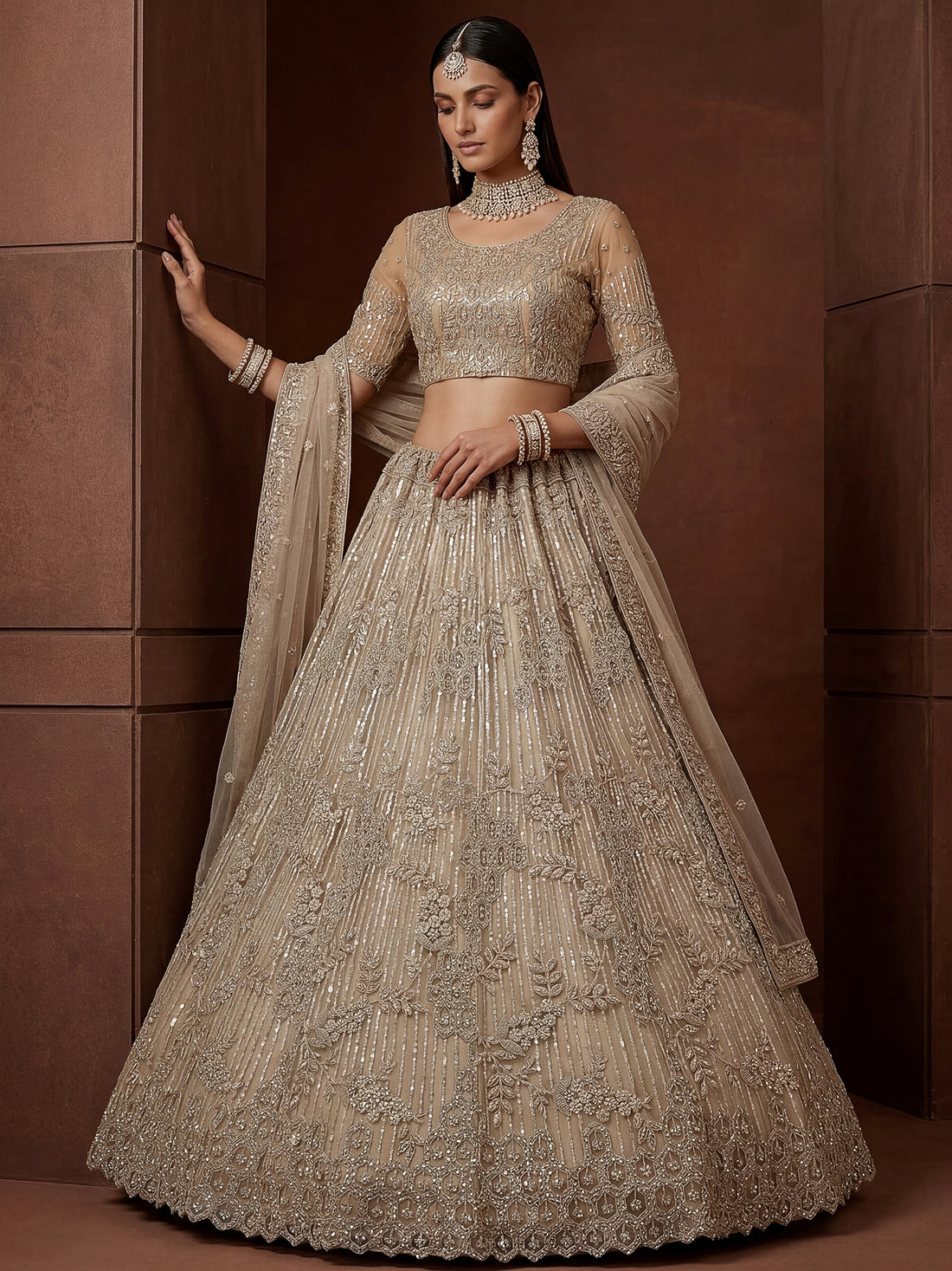 Incredible Beige Zari Embroidery Net Wedding Lehenga Choli