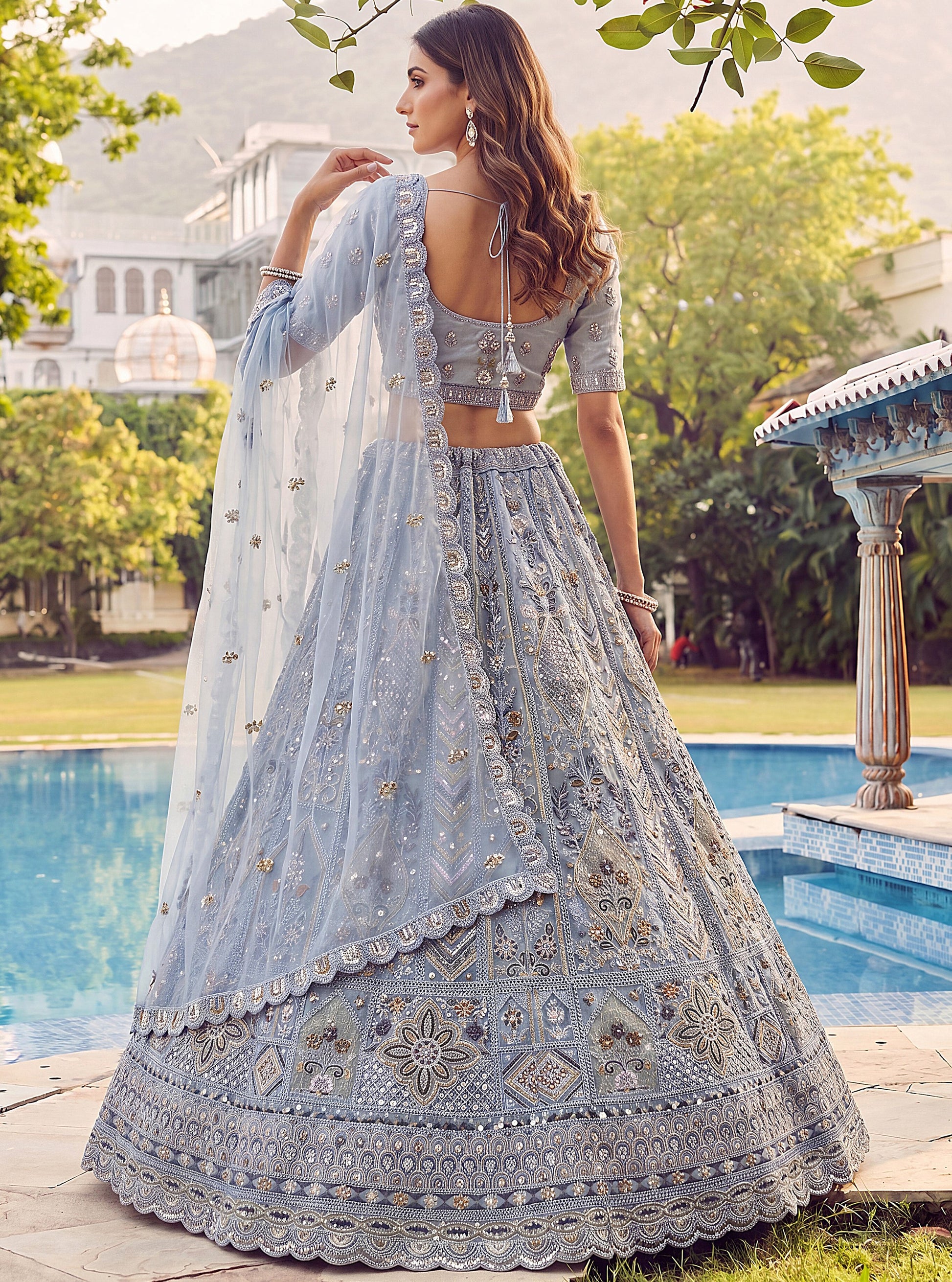 Gorgeous Sky Blue Sequins Work Net Wedding Wear Lehenga Choli With Dupatta